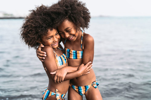 Sisters at a beach.