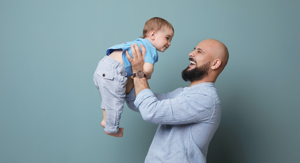 Bald man with child