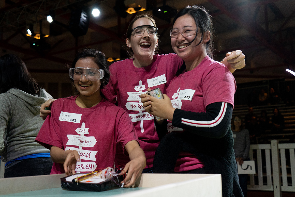 Girls celebrating during The Tech Challenge Final Showcase.