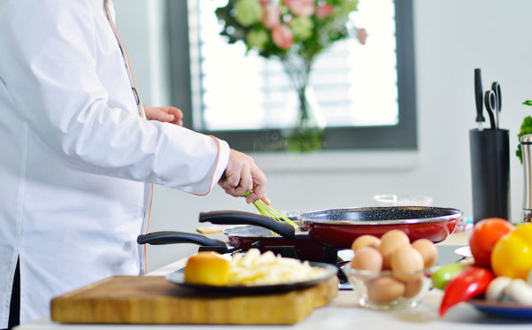 Person preparing a meal.