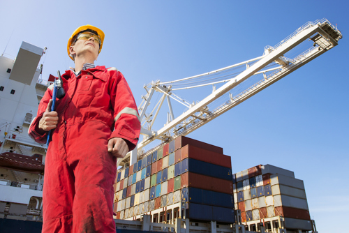 Worker and shipping containers