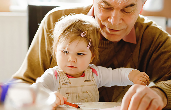 Grandparent and grandchild bonding together.